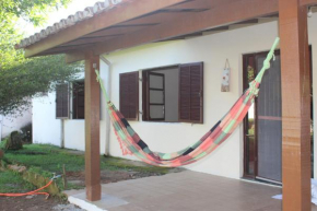 Casa na praia com pomar